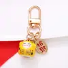 Estilo Chino Atrae Fortuna Cerámica Gato de la Suerte Llavero Colgante Estuche para Auriculares Bolso Encanto Accesorio Adornos Pequeños Venta al por Mayor