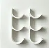 Soporte de pared multi-rollo transfronterizo 2026/3D, organizador de tres niveles de pared para film transparente y papel pergamino para la cocina