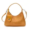 Outono 2026 Novas Bolsas Bolsa de Ombro Versátil Moda Sensação de Luxo Bolsa de Mão para o Trabalho Bolsa de Mão Tecida para Ombro