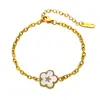 Pulsera de acero inoxidable estilo INS europeo y americano chapada en oro de 18k pulsera de flor pulsera de acero inoxidable flor de cinco pétalos frítilara blanca