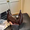 Bolso de Mujer 2025 Otoño Nuevo Estilo Bolso de Hombro Único Cruzado Textura Retro Nicho Francés Bolso de Axila Simple Elegante