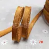 En stock 48 colores poliéster velcro con borde de cordón ribeteado tira de inserción de cuerda para ropa colchas sofás cojines tira de ribete