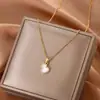 Nueva cadena de clavícula de lujo estilo coreano, collar versátil de acero de titanio de moda para mujer, colgante simple clásico de circón, accesorio versátil