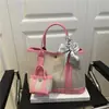 Bolsa de Jardín de Lona de Gama Alta 2025 Nueva Bolso de Mujer de Color Contrastante Bolso de Hombro Casual para Viajar Bolso Tote Estilo Occidental