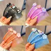 Puesto de网红 mercado nocturno patrón de un dólar accesorios para el cabello pinza para el cabello al por mayor tocado de dibujos animados tocado cuerda puesto de joyería pinza para el cabello mercancía