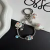 Cadena Hueso de Serpiente Original Tendencia Xiaohongshu Colgante Graffiti Cadena para Teléfono Llavero de Moda Accesorio para Bolso Versátil