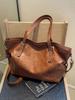 2024 Sacola de grande capacidade Bolsa geral retrô da moda Bolsa de ombro casual simples de grande capacidade Bolsa transversal estilo ocidental da moda