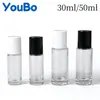 Botella dispensadora de aceite de ricino de vidrio transparente de 30 ml y 50 ml Botella con rodillo de jade de cristal rosa natural Botella con rodillo de cuarzo rosa
