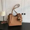Bolso tote diario de color liso transfronterizo, bolso de gran capacidad de moda para mujer, nuevo estilo Otoño 2026, bolso de hombro único a la moda para ir al trabajo