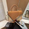 Moda textura cor combinação nova 2025 cor contrastante primavera casual simples estilo estrangeiro bolsa transversal pequena quadrada para mulheres