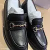 Mocasines de cuero de alta calidad de Guangzhou para mujer, nuevos 2026 primavera y otoño, zapatos planos de cuero estilo británico negro