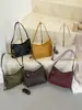 Bolso pequeño cuadrado de color liso con patrón tejido simple de estilo alto Shuai Mi Jia, bolso de hombro cruzado para el día a día informal y relajado