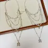 Collar con Colgante de Hebilla de Herradura Estilo Vintage Europeo y Americano Cadena para Clavícula Apilable de Múltiples Capas Temperamento Accesorios de Perlas Nuevos 2026 para Mujer