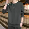 Sudadera de otoño e invierno para hombre, versátil, holgada, casual, moderna, de cuello redondo, con forro polar, elegante camisa básica