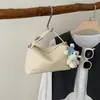 Bolso de mano de alta costura estilo coreano, bolso de hombro, nuevo modelo primavera 2026, bolso tipo almohada casual simple, bolso cruzado de nicho para mujer