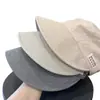 Sombrero de Pescador Parcheado a Rayas Nuevo Coreano para Mujer, Estilo Delgado de Verano, Ala Ancha para Sombrear el Sol, Adelgazante de Rostro, Protección Solar, Sombrero de Moda