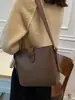 Bolso de mujer vintage de alta gama 2026 versión coreana nuevo de moda bolso tipo cubo de gran capacidad bolso cruzado casual de moda con textura