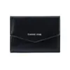 Cierre de cremallera ~ nueva cartera corta plegable para mujer al por mayor de alta gama diseño de nicho cartera de tela de moda