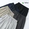 Pantalones de Secado Rápido para Hombre a Prueba de Tres Elementos de Teflón Fibra Elástica en Cuatro Direcciones de Nailon Ligeros Modernos para Fitness Casual de Pierna Recta