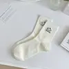 Meias brancas femininas estilo coreano de cano médio ins da moda JK girl estilo japonês fofo desenho animado de cachorrinho meias de estudante meias de algodão