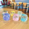 Nueva taza flash iceberg botella de arena movediza con aceite decoración llavero colgante pequeña joyería caja ciega regalo de bienestar venta al por mayor