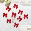 Ins Celebridad de Internet popular resina joyería para uñas al por mayor cinta de color lazo diy corbata de lazo tridimensional accesorios para uñas