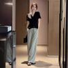 Traje casual de moda coreana, novedad de verano 2024, top negro holgado de manga corta con cuello en V, ropa de dos piezas para mujer
