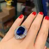 Moda europea y americana simulación tansan Anillo de diamante azul tesoro piedra principal 10*12