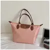 Bolso de hombro impermeable de moda versátil de tela Oxford de gran capacidad, adecuado para mamás, mujeres y viajes; bolsa de mano de nailon