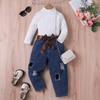 Europa y Estados Unidos ropa infantil transfronteriza para niñas otoño e invierno pit color liso manga larga suéter agujero Pantalones de mezclilla conjunto de dos piezas