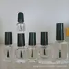 Suministro de fábrica botella de esmalte de uñas con tapa cepillo botella de pintura Botella vacía de esmalte de uñas Botella vacía de esmalte de uñas 15ml botella con cepillo