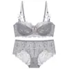 Lingerie sexy estilo francês para mulheres com bustos grandes, projetada para minimizar a aparência e prevenir a flacidez, apresentando um sutiã fino de algodão com meia-copa e um conjunto de sutiã de renda em tamanhos grandes, perfeito para o verão