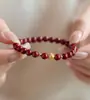 Atacado de fábrica pulseira de cinábrio de alto teor pulseira de areia dourada roxa areia imperial treme e-commerce uma geração de cabelo