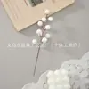 Simulación transfronteriza de suministro navideño Accesorios de rama de flor Planta verde de simulación Decoración navideña Planta de simulación Fruta roja Rama de fruta de baya