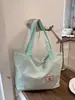 Bolsa de mano casual de nailon estilo coreano, bolso de mano de moda con estampado de letras, popular bolso de hombro de rayas reversible para mujer