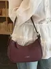 Bolso de moda tipo medialuna estilo coreano para mujer, nuevo bolso de mano casual de nicho primavera 2026, bolso de hombro de moda, bolso de axila para damas