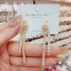 Pendientes largos con borlas de circonita, elegantes, de lujo y de alta calidad, con diseño de nicho para mujer, estilo frío y personalidad de celebridades.