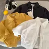 Ropa de abrigo para niños 2026 nueva colección de otoño: chaquetas de color liso con cuello para niños y niñas, playeras lisas con cierre para bebés, estilo moderno