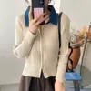 Cárdigan de punto suave estilo coreano para mujer, nuevo modelo de otoño e invierno, imitación de dos piezas con patchwork de mezclilla y cuello camisero, chaqueta versátil
