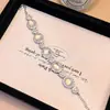 Novo Bracelete de Calcedônia Branca Natural de Alta Qualidade Estilo Chinês com Cravação Completa em Diamante Banhado a Prata para Mulheres