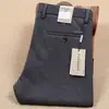Calça casual de negócios masculina de outono e inverno, quente, grossa, de lã, macia, poliéster, fibra reciclada, elástica, não amassa, anti-rugas