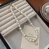 Collar Clavícula Manta Rose Cubo de Azúcar Perla para Mujer 2026 Nuevo Estilo de Lujo Ligero Nicho Cadena para el Cuello Accesorio