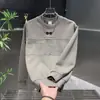 Moletom estiloso e casual, nova coleção de outono, gola redonda, design patchwork com estampas, alta qualidade, peça masculina da moda de uma marca popular