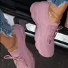 Zapatillas talla grande mujer 2021 primavera nuevo suela gruesa color liso con cordones tejido volador de un paso zapatos de papá wish transfronterizo