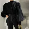 Corea del Sur chic otoño estilo francés cuello alto medio diseño de botón trasero sentido de diseño moda nicho blusa top de manga farol para mujer