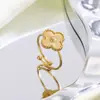 Pulsera de trébol de cuatro hojas de acero de titanio transfronteriza, juego de trébol de cuatro hojas, collar, anillo, pendientes, juego de joyería de acero de titanio con láser al por mayor