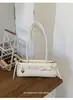 Bolsa Boston Casual Versátil Transfronteiriça para Mulheres, Novo Estilo Primavera 2026, Luxo Leve, Estilosa, Bolsa de Ombro/Axila de Nicho