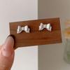 Pendientes minimalistas de plata Viento Frío Amor Inteligente para Mujer, Aguja de Plata, Nicho, Exquisitos, Huecos, Lazo, Pendientes de Alta Gama