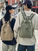 Mochila informal de color sólido para viajes transfronterizos, nueva mochila pequeña ligera para viajes de comercio exterior, mochila escolar para estudiantes que combina con todo.