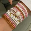Set de Joyería Bohemio de Vacaciones de Venta Caliente Europea y Americana Pulsera de Cuentas de Arroz de Color Contrastante con Concha Dopamina para Playa de Verano
